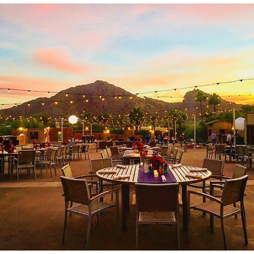 Corporate, upscale dinner overlooking Camelback Mountain at sunset in Phoenix, Arizona.